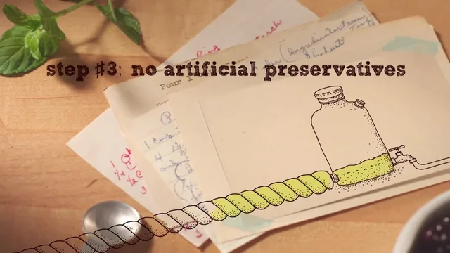 Old handwritten recipe cards, with a drawn jar of yellow puree linked to a twisted yellow rope, under step #3: no artificial preservatives
