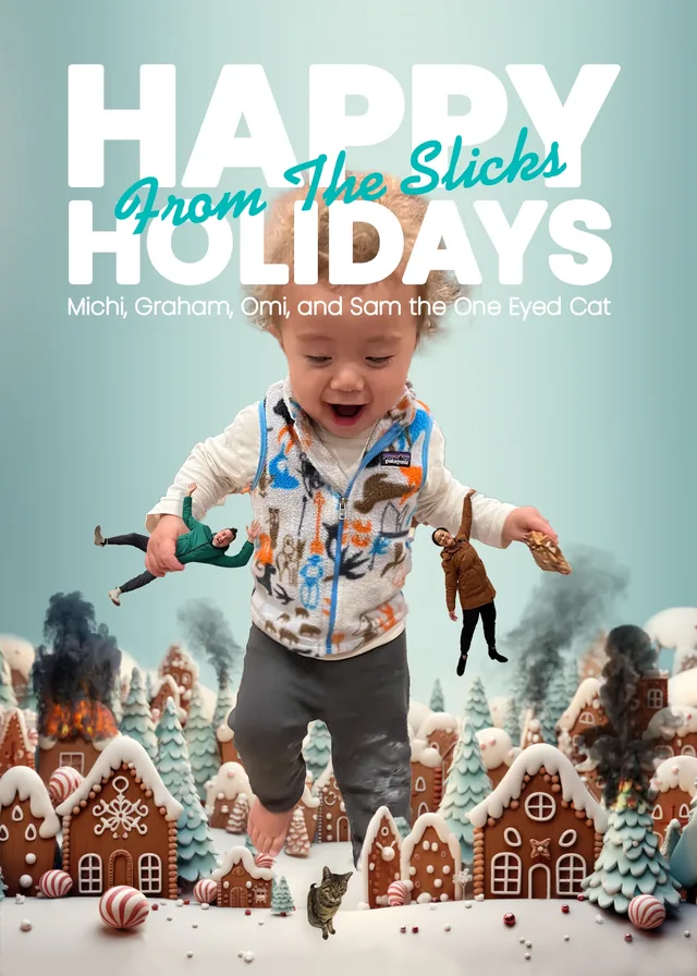 A toddler in a winter jacket leaps over a gingerbread village, under Happy Holidays from the Slicks