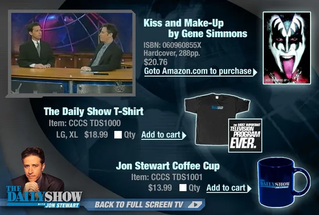 Buy Our Stuff: the show shrunk to a thumbnail at the top left, beside Kiss and Make-Up by Gene Simmons ($20.76, Goto Amazon.com to purchase), a Daily Show T-shirt ($18.99) and a Jon Stewart coffee cup ($13.99), each with Add to cart, Jon Stewart’s photo and Back to Full Screen TV