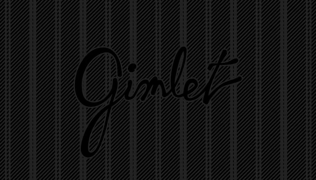 The front of the business card: Gimlet in black script on charcoal pinstripes
