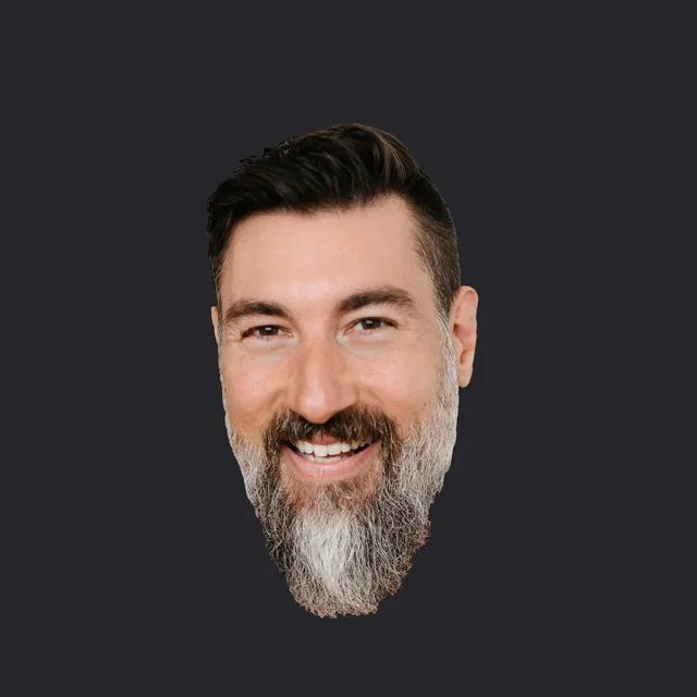 The same cut-out of Graham’s smiling head on a charcoal gray square