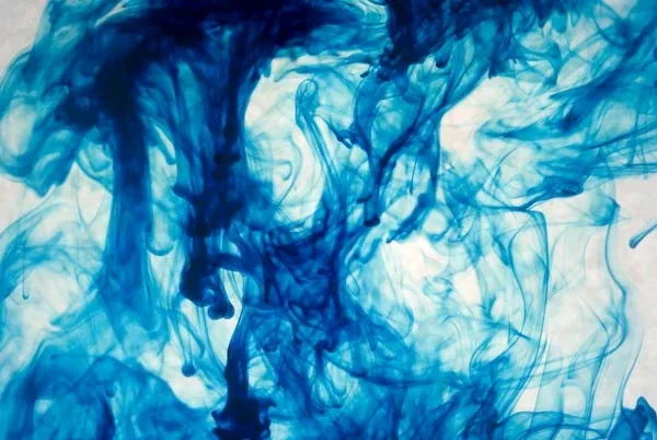 Blue ink in swirls and veils