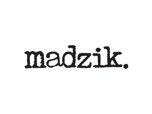 The Madzik logo: madzik. in a black, worn typewriter face on white
