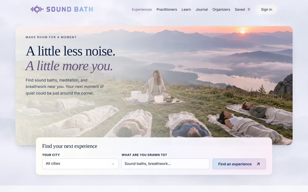 The SoundBath.co homepage: “A little less noise. A little more you.” over a photograph of people resting on a hillside, with a search for city and experience