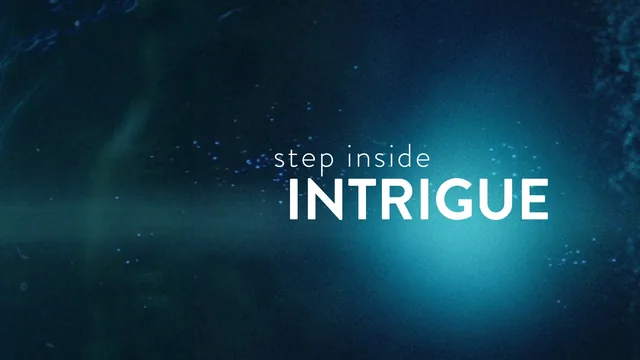 A title card from the pitch video: step inside, Intrigue, in white light on a deep blue ground flecked with stars