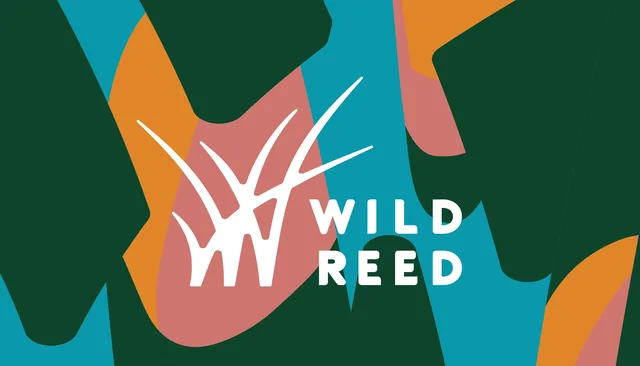 The front of the business card: the white logo on a patchwork of teal, forest green, orange and pink
