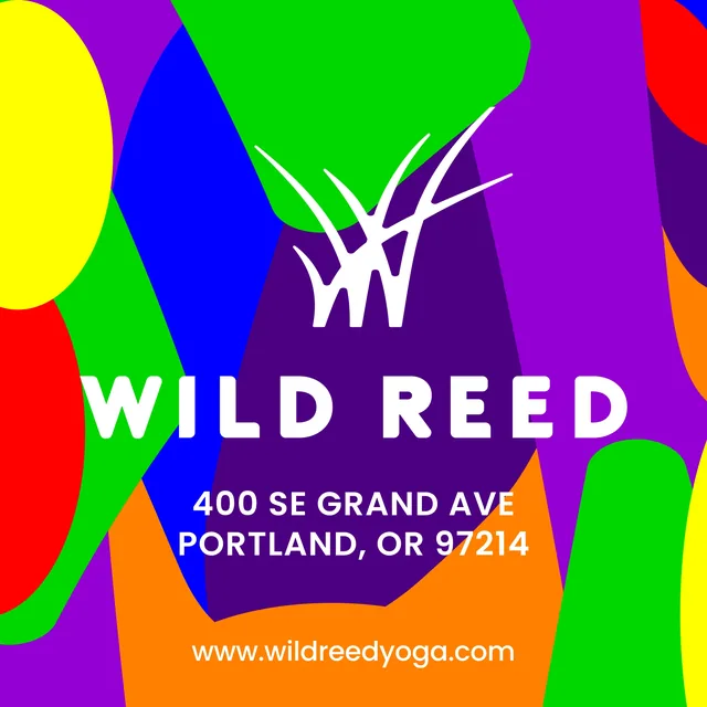 Its back: the white logo and the address on a patchwork of red, orange, yellow, green, blue and purple