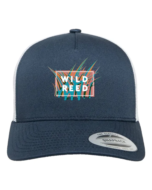 A navy trucker hat with a white mesh back and the patterned badge on the front